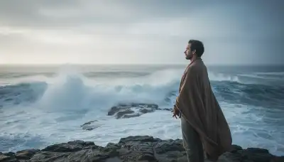 Photorealistic portrait of a serene person standing by a misty ocean coastline, watching a large wave break, conveying inner peace and the 'urge surfing' concept of observing cravings without reacting, cool blue and grey tones, cinematic nature lighting.
