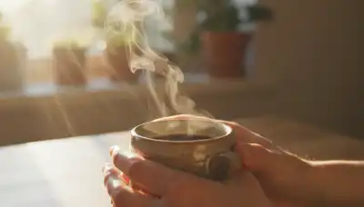 Extreme close-up photorealistic shot of a person's hands gently holding a ceramic mug of hot coffee. Soft, warm morning sunlight streaming through a nearby window, beautifully illuminating the rising steam. The atmosphere is peaceful, serene, and deeply mindful, capturing a small everyday moment of comfort and intentional pause. Depth of field, macro photography.