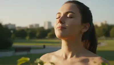 A hyper-realistic close-up of a person's face bathed in soft morning sunlight, taking a deep, mindful breath outdoors. The background is a gently blurred urban park, emphasizing serenity, mental clarity, and profound connection to the present moment. Crisp details, natural and uplifting lighting.