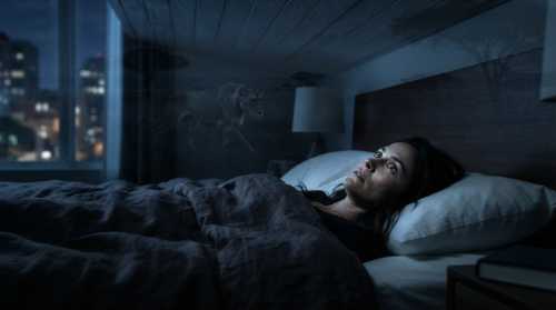 High-resolution, cinematic, photorealistic image of a person lying in a modern bedroom at night, wide awake with eyes open, staring at the ceiling. A subtle, ghostly, double-exposure overlay of a prehistoric African savannah with a stalking predator is blended in the background, symbolizing the evolutionary mismatch of stress. Mood lighting, cool blue and dark shadows, 8k resolution, highly detailed.